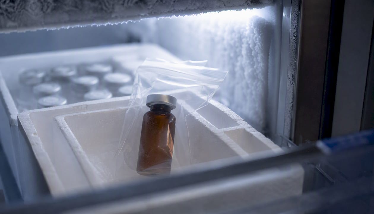 Amber vial sealed inside secondary bag in freezer