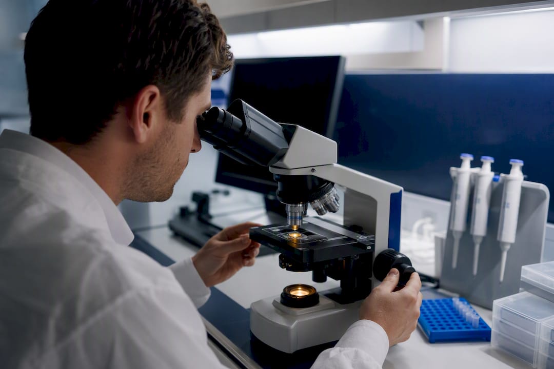 Microscope observing mitochondrial fluorescence